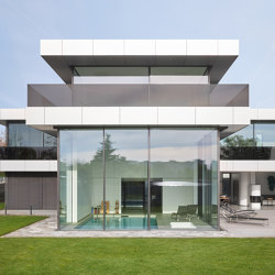 Frameless sliding windows measuring up to 25 m2 | Patio doors | swissFineLine